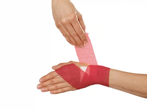 Peha-haft Color Fixierbinden, rot Hartmann